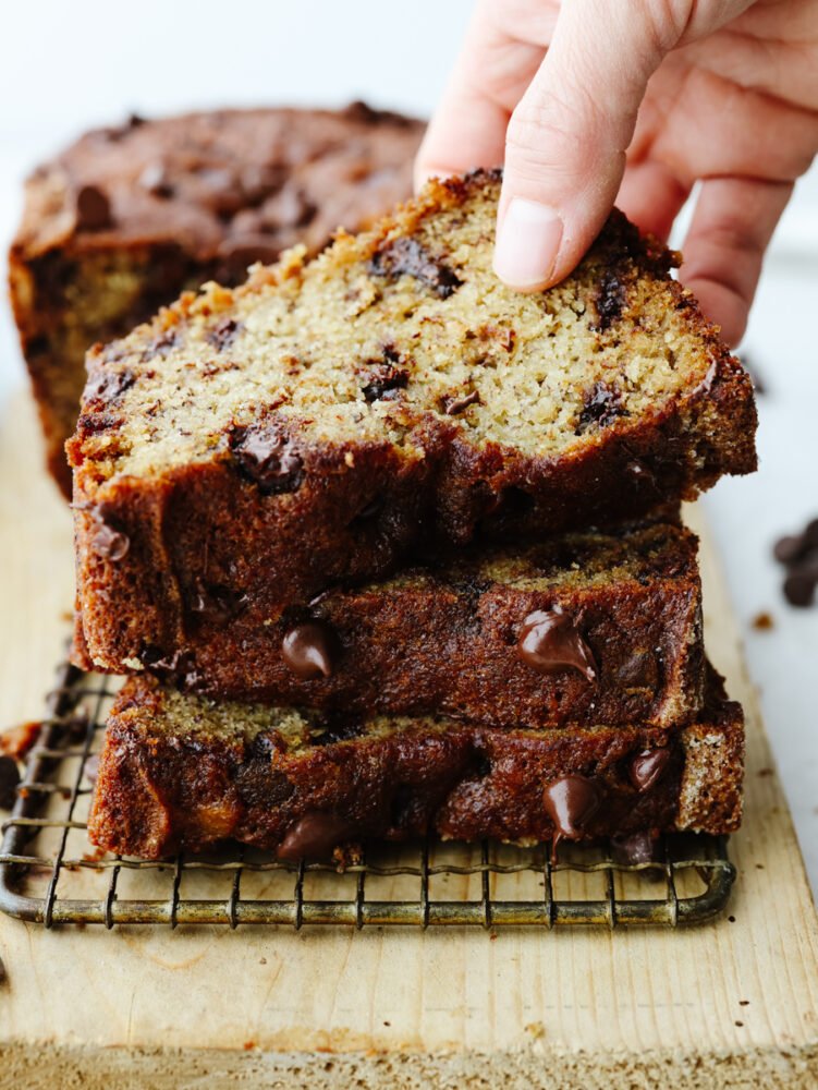 A stack of sliced chocolate chip banana bread. 
