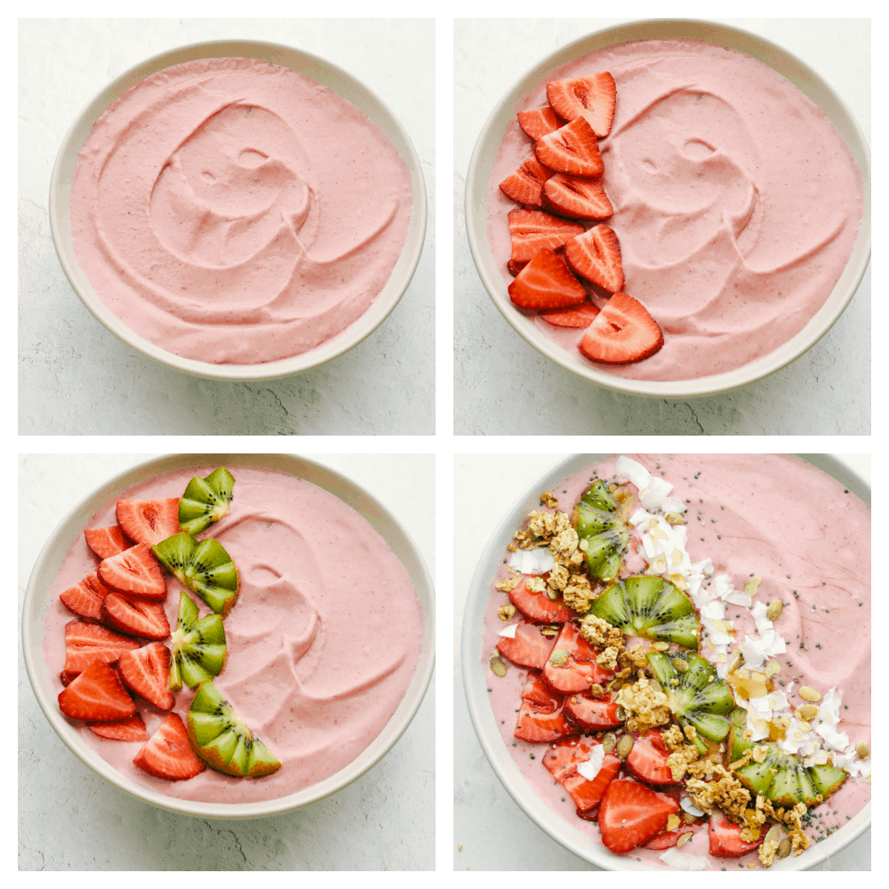 The smoothie in the bowl and being topped with strawberries, kiwii, coconut and granola. 