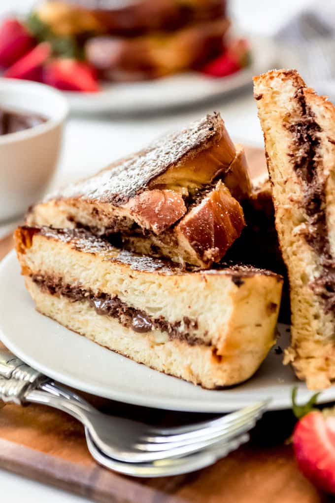 An image of a piece of french toast stuffed with Nutella on a plate.