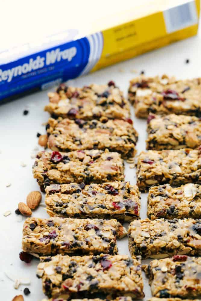 Granola bars cut into slices with the Reynolds wrap in the back ground. 