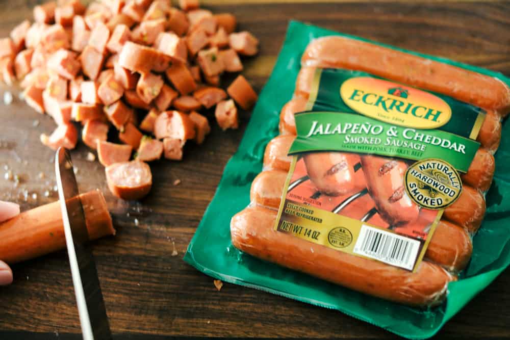 Eckrich jalapeno & cheddar smoked sausage package and cut up sausage next to it.
