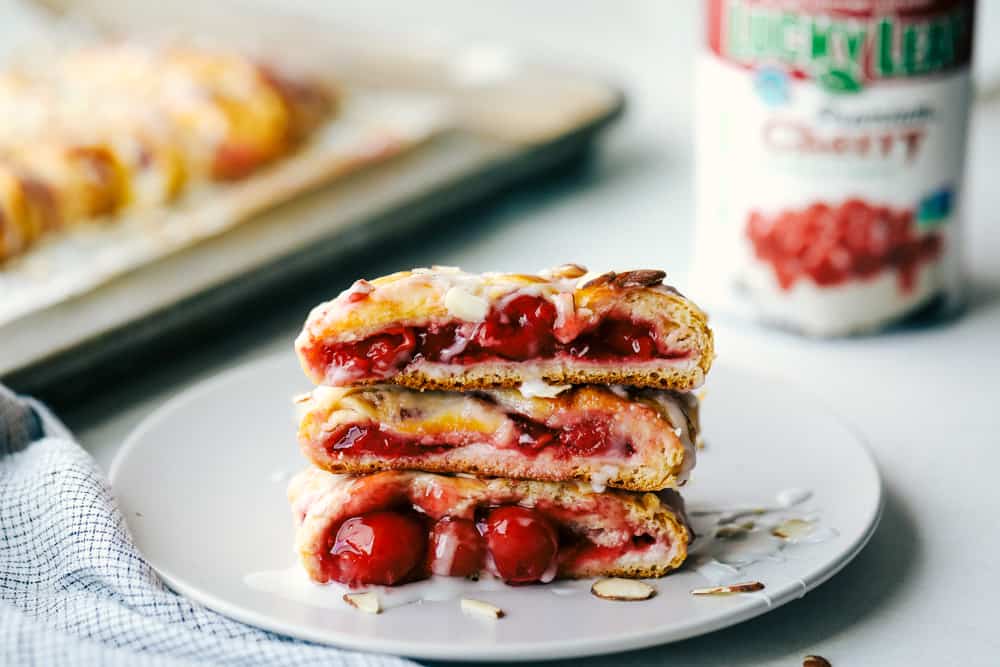 Slices of cherry almond cream cheese breakfast braid on a plate