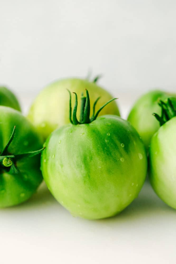 Green tomatoes close up.